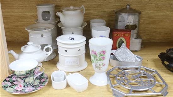 A quantity of French ceramic coffee warmers, etc